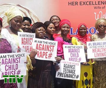 Wife of the Governor of Lagos State and convener, Lagos Women Forum, Mrs. Bolanle Ambode (9th left) and members of Committee of Wives of Lagos State Officials (COWLSO), with placards bearing the message: ‘Be the Voice for Healthy living…, Against Domestic Violence, Rape, Child Abuse & Teenage Pregnancy”, during the forum, with the theme: ‘Woman…Your Health, Your Social Environment’, held at the Police College, GRA, Ikeja, on Tuesday, 19th June 2018.<br/>